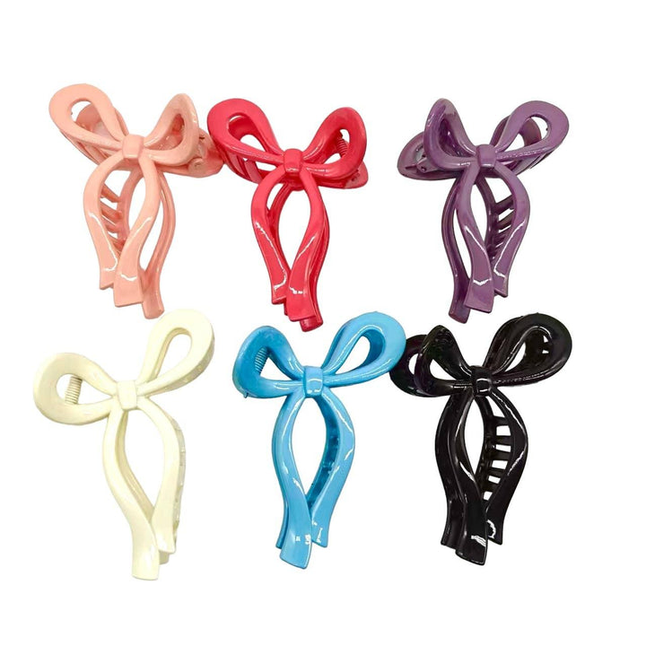 claw clip shaped like a bow in 6 different colors: black, blue, red, pink, beige, blue 