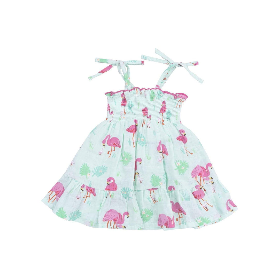 light turquoise sundress and hot pink flamingo print, with big ruffle at the bottom and spaghetti straps 