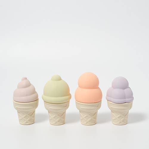 silicone ice cream cones with pastel ice cream toppers. the tops come off so that they are easy to play with at the beach and in the pool. 