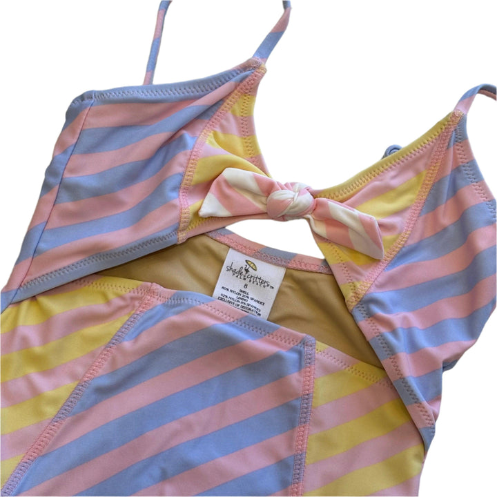 one piece bathing suit with pastel stripes in pink and lavender and pink and yellow with a tie in the center of the chest and small cut out. 