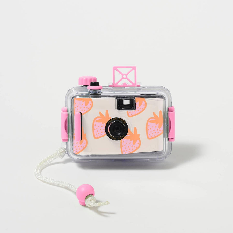underwater camera with strawberry print on the front of the camera. pink accents on a clear case