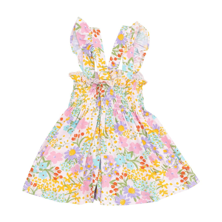 back of baby dress with the criss cross straps. vibrant flowers: yellow, pink,red and purple. smocked top. 