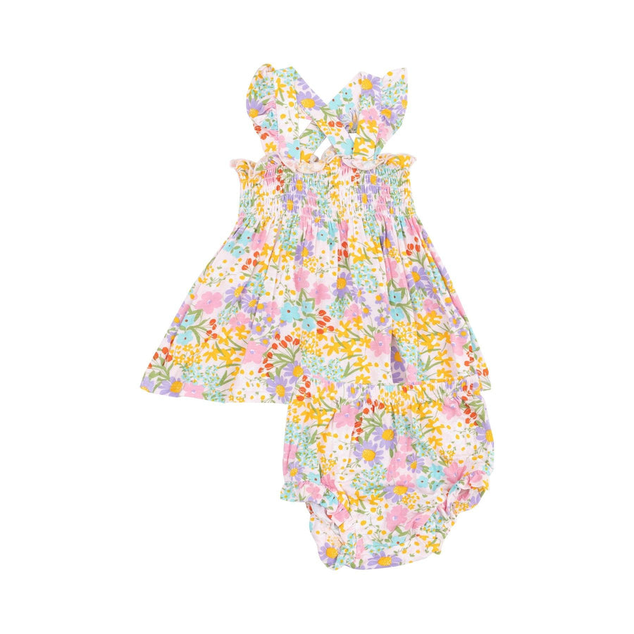 baby girls dress with smocked top in multi colored floral and spghetti straps that criss cross in the back. matching diaper cover. 