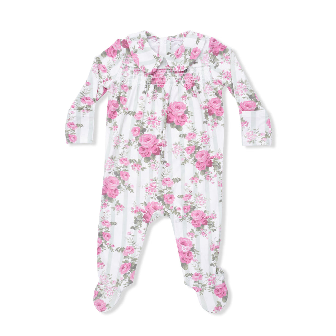 Floral patterned baby onesie on a white background