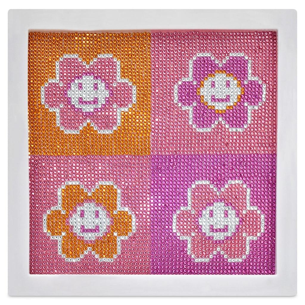 smiley face painting where the smiley faces are in the middle of flowers. the colors in the painting are pink, lavender and orange. 