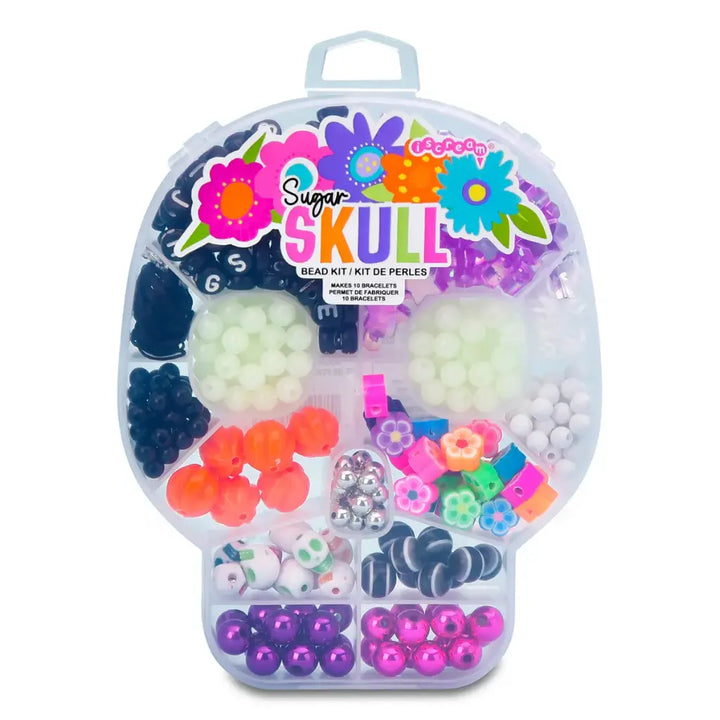 Bead kit packaging shaped like a sugar skull with colorful beads inside, on a white background.