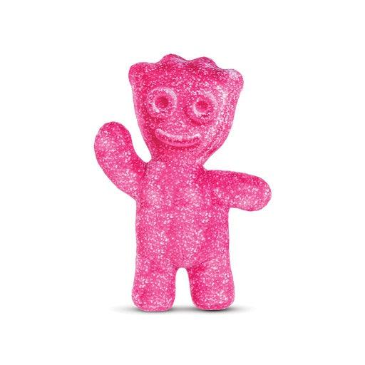 sour patch kid waving his hand in the air. the color of the candy is pink