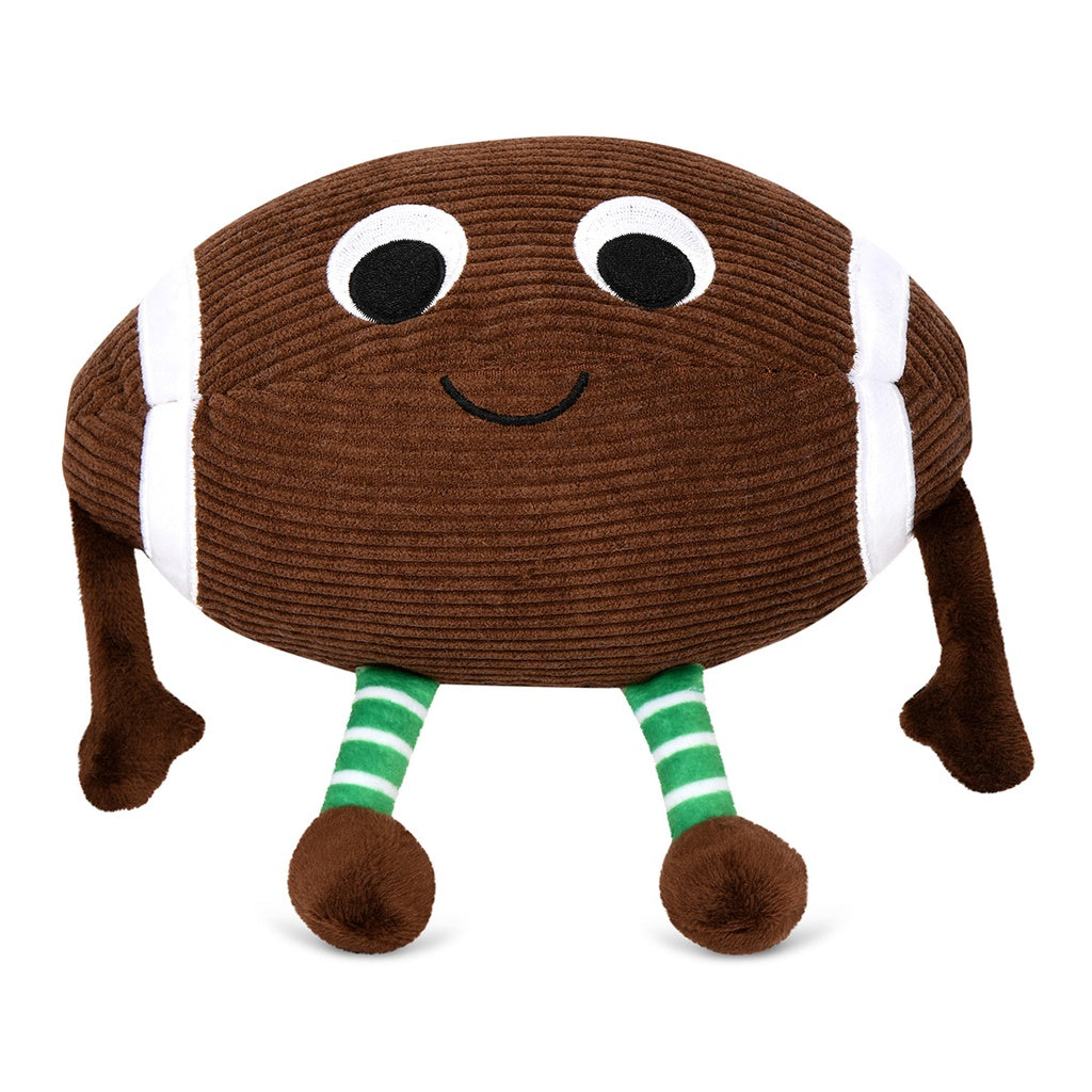 Plush toy resembling a football with legs and smiling face on a white background