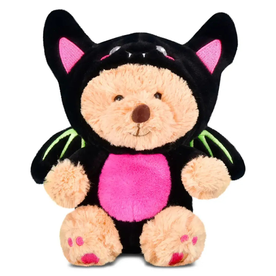 Plush toy bear in a black bat costume with pink accents on a white background