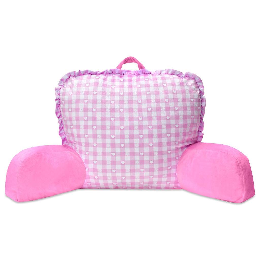 lounge pillow with handle and two arms for leaning into to read or get comfy.  back of pillow is pink and gighnam with hearts and sold pink arms for leaning. 