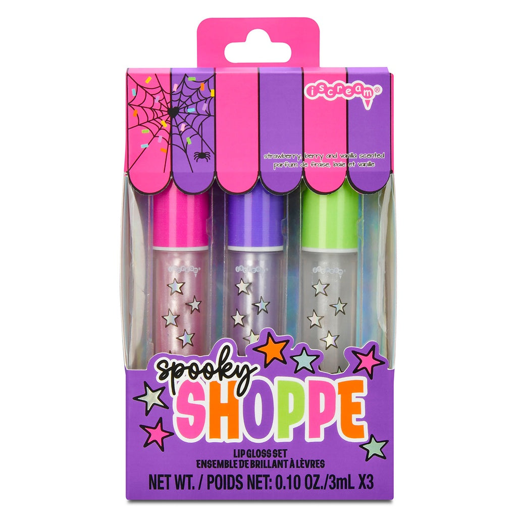 Spooky Shoppe lip gloss set packaging with three lip glosses in pink, purple, and green on a white background.