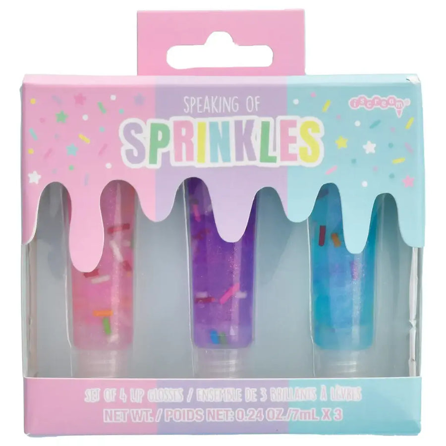 Packaging of lip glosses with colorful design and text 'Speaking of Sprinkles' on a white background.