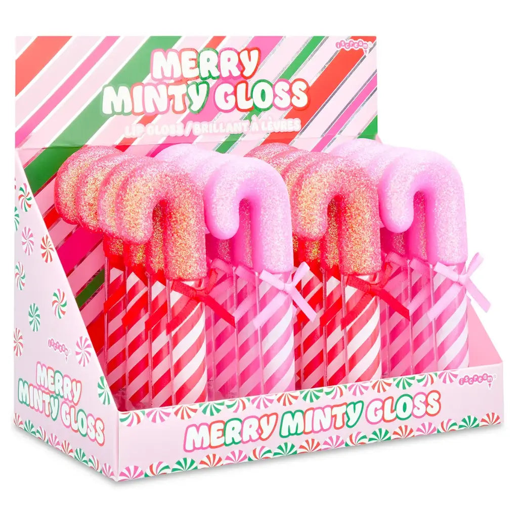 Display of 'Merry Minty Gloss' candy cane-shaped lip glosses in a decorative box.