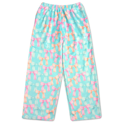 plush pants in a turquoise color with pink, teal and peach bows all over. 