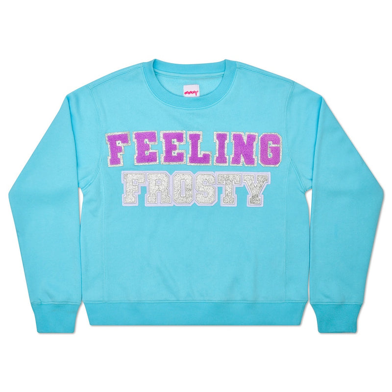 blue sweatshirt with "feeling frosty" written on it.  Feeling is in purple patches and frosty is in silver letters. 