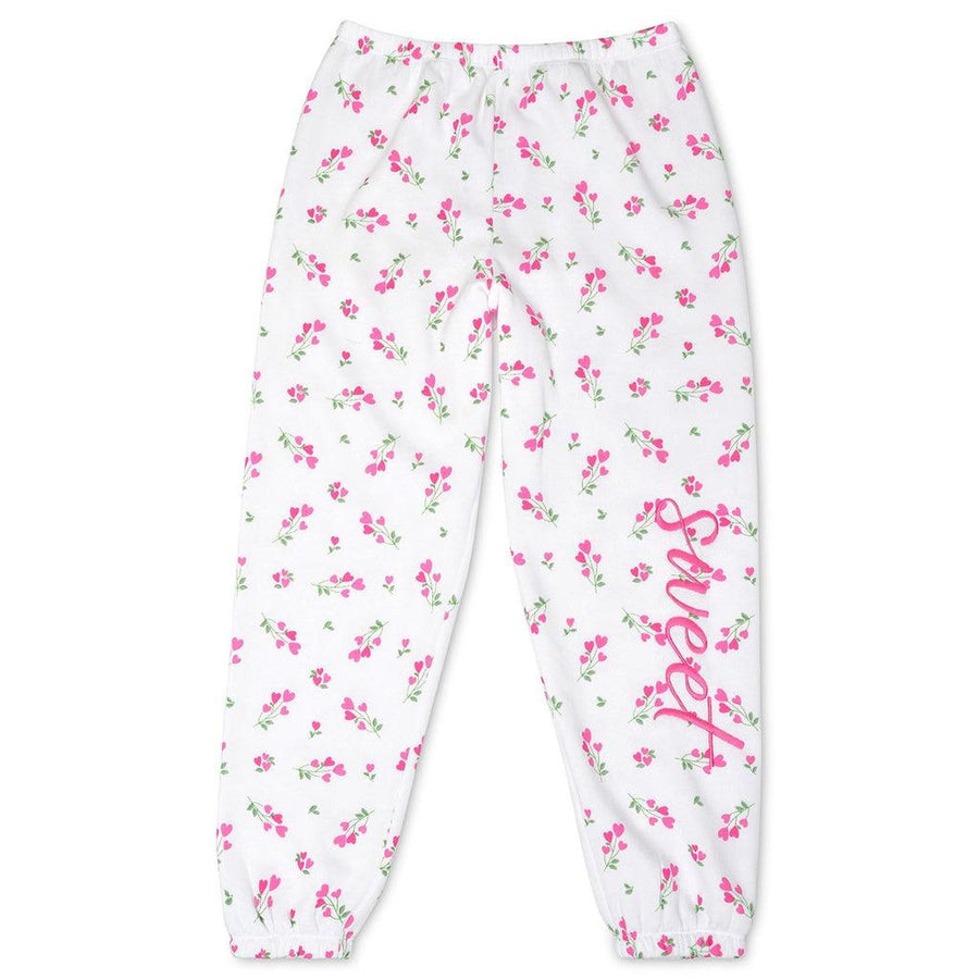 white sweatpants with tiny hearts in floral bouquets on a stem with the word 'sweet' written down the side on the left leg