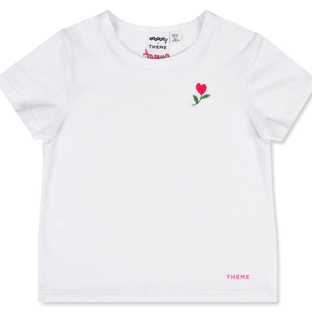 white cotton tee with heart flower embroidery on the left hand side 