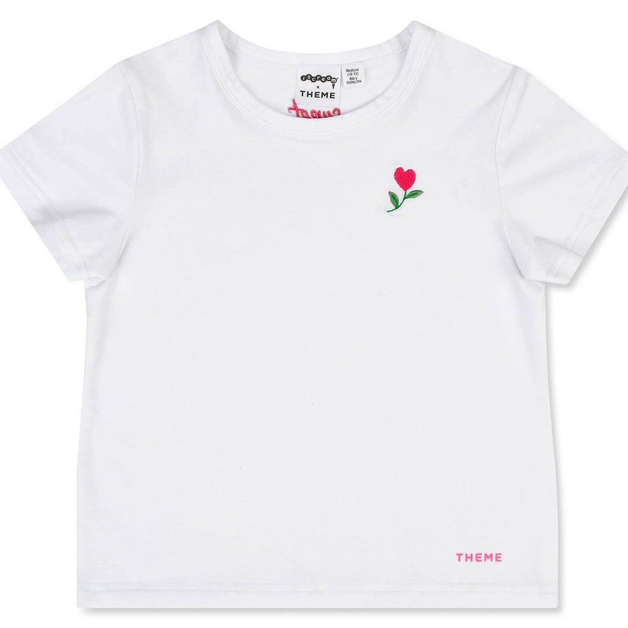 white cotton tee with heart flower embroidery on the left hand side 