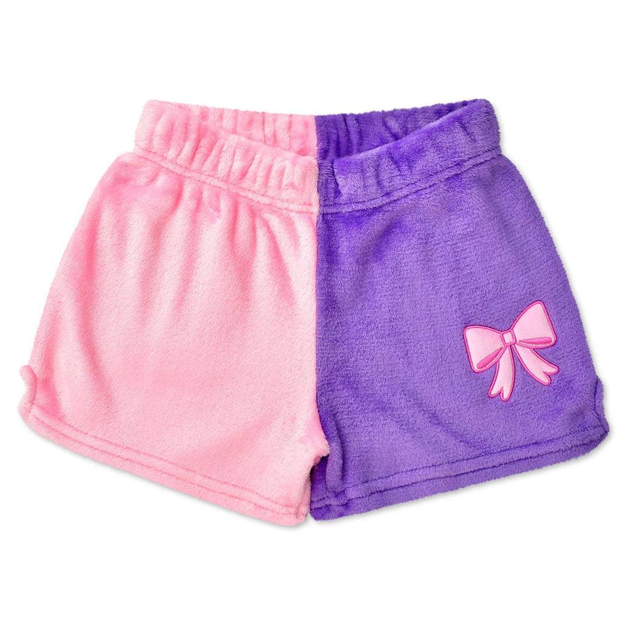 pink and purple plush shorts. one leg is pink and the other is purple with a pink box on the leg. 