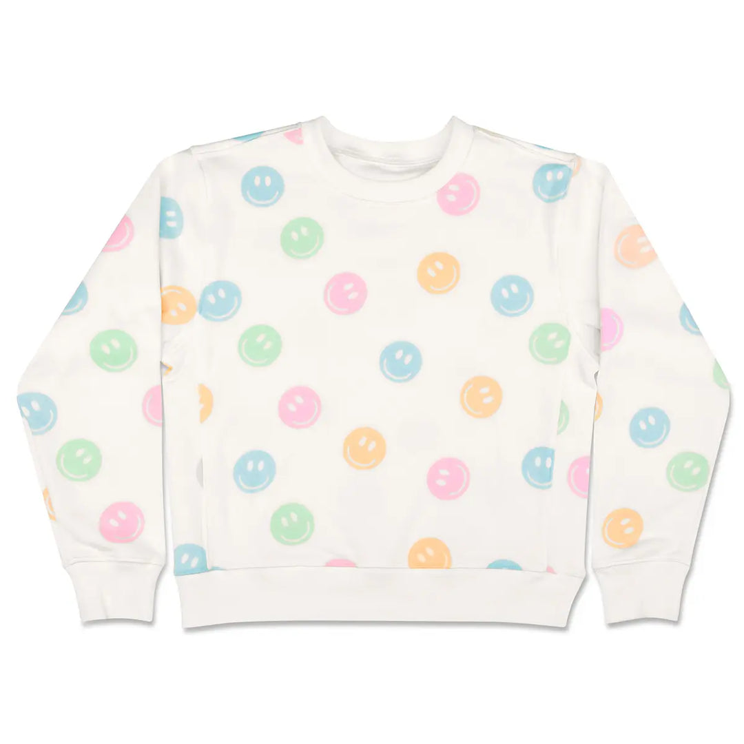 White sweatshirt with colorful smiley face pattern on a white background