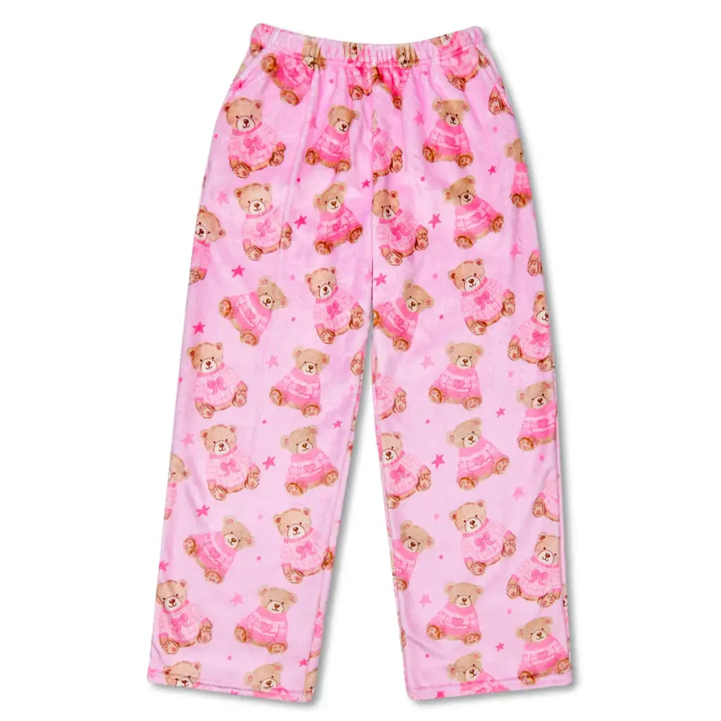 Pink pajama pants with teddy bear pattern on a white background