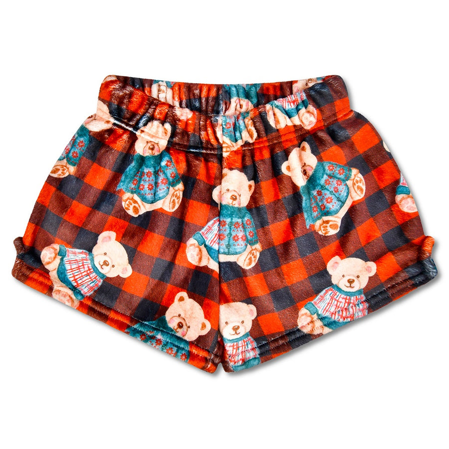 Plaid shorts with teddy bear pattern on a white background