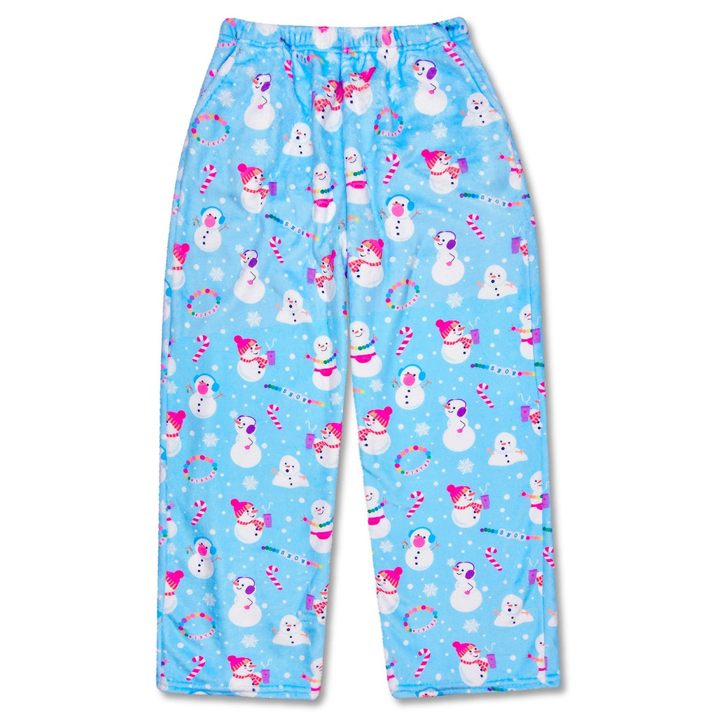 Fleece pants with snowman and candy cane pattern on a blue background