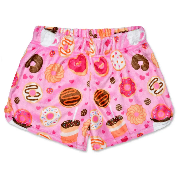 Pink shorts with donut pattern on a white background