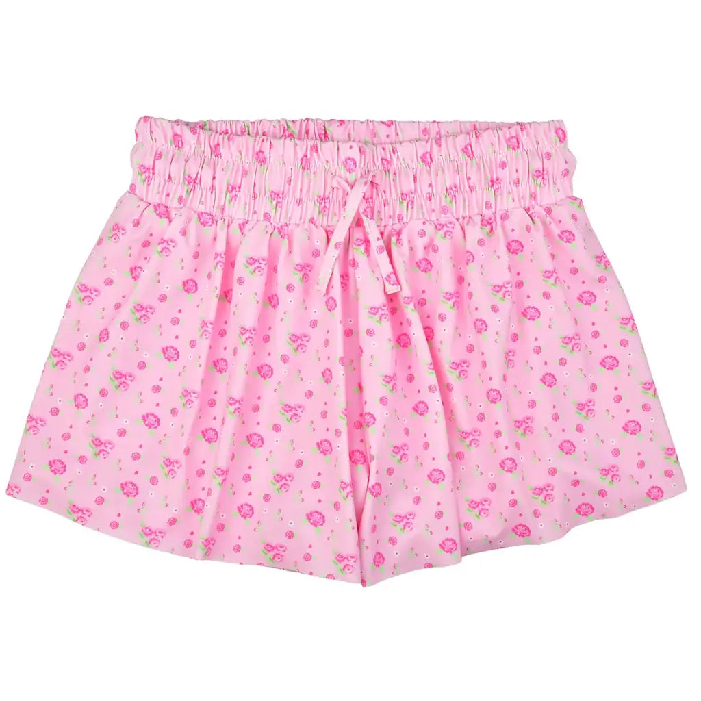 Pink floral shorts on a white background