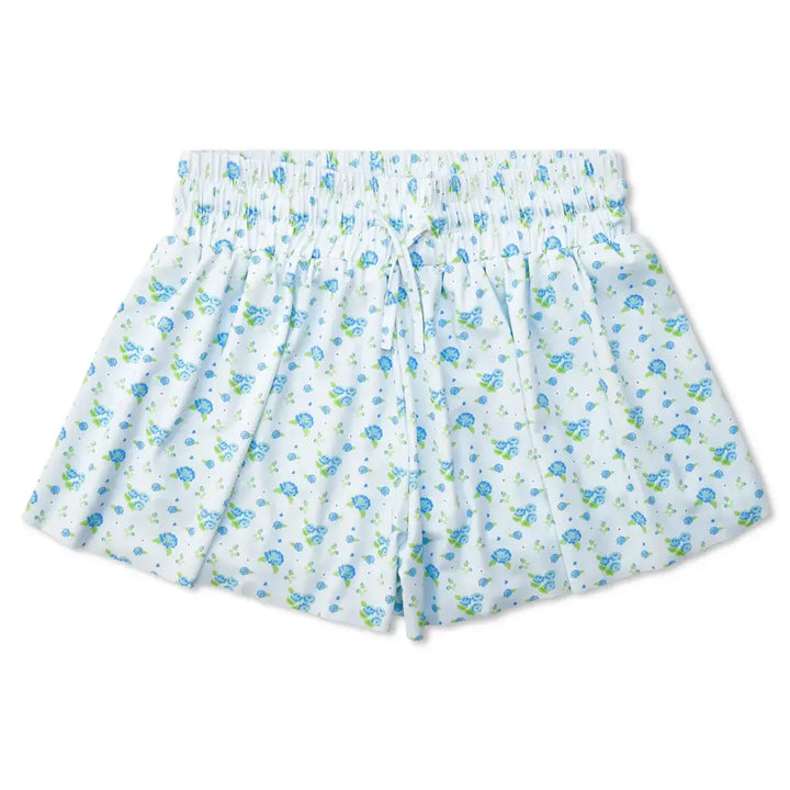 Floral patterned shorts on a white background