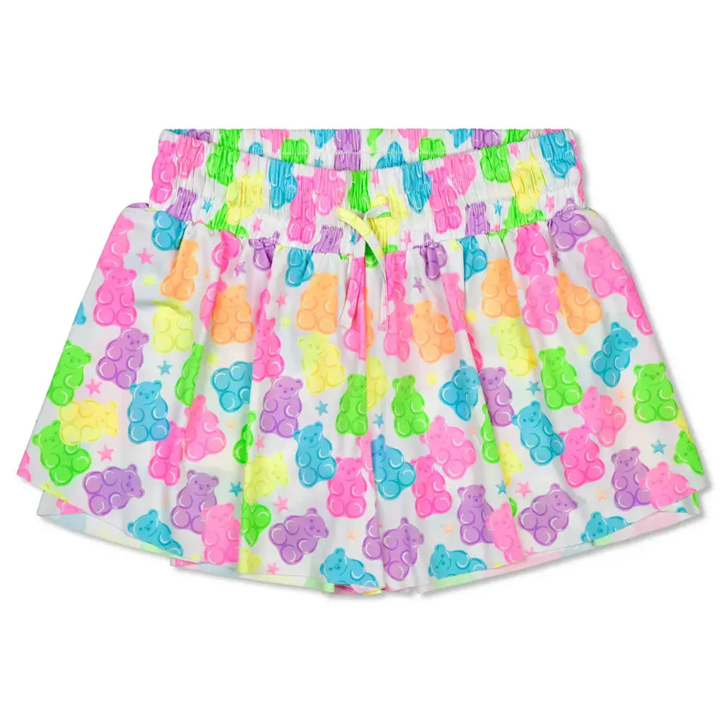 Shorts with colorful gummy bear pattern on a white background