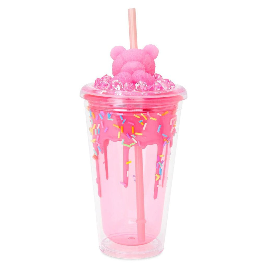 plastci pink tumbler with bear on the top of the lid, sprinkles inside the tumbler . straw coming out of the top