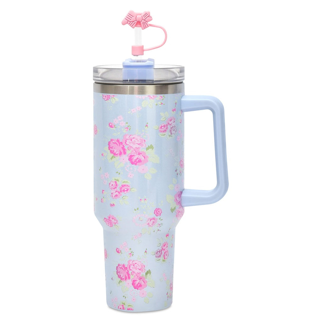 blue travel cup with pink floral print all over it. 