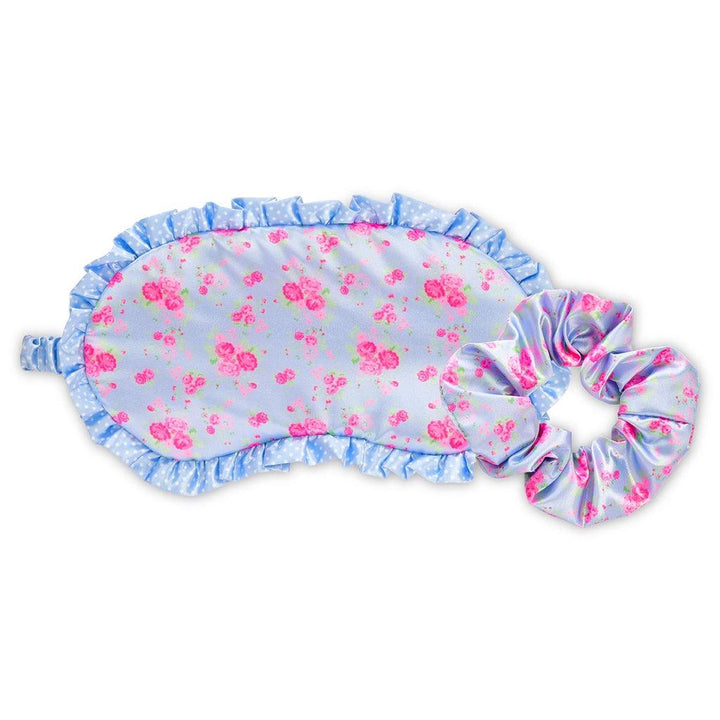 satin eye mask with ditsy pink florals on a blue base with matching scrunchie