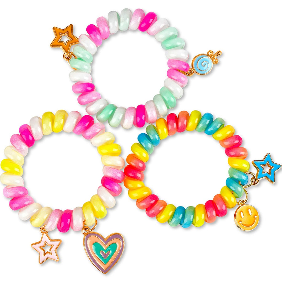 Colorful bracelets that can double as bracelets with various charms on a white background