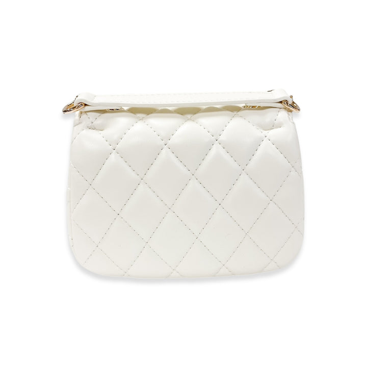 White quilted bag on a white background