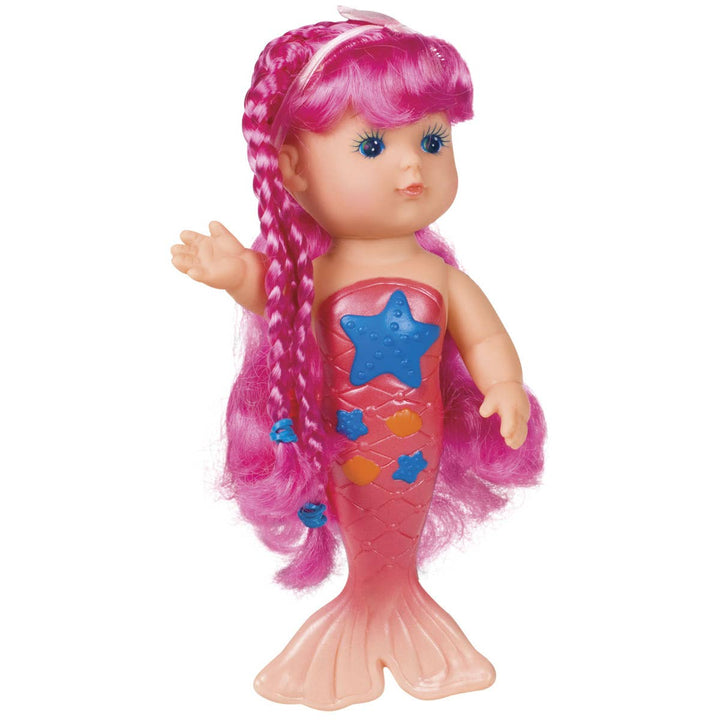 Mermaid doll with pink hair and tail on a white background