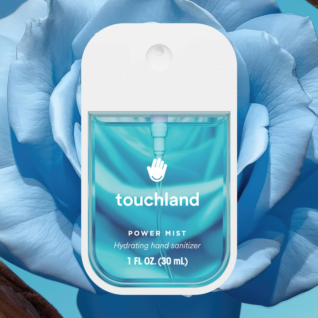 Touchland hand sanitizer with blue design on a blue floral background