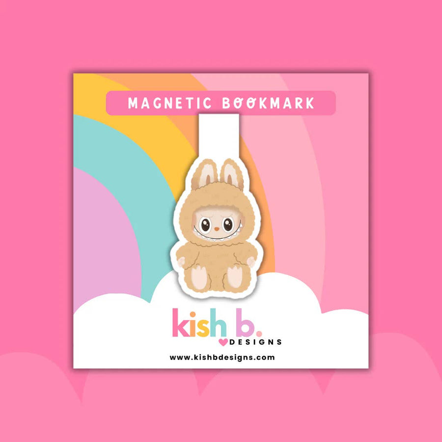 Magnetic bookmark with a cartoon labubu  character in a bunny costume on a colorful background, featuring the brand 'kish b.'