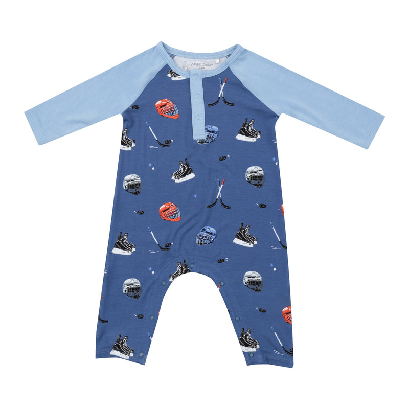 navy baby boy one piece jumpsuit with hockey motif all over the body