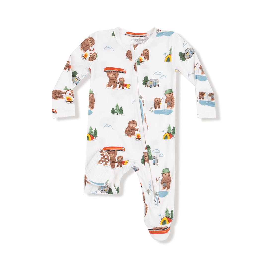 Children's onesie with bear and nature pattern on a white background