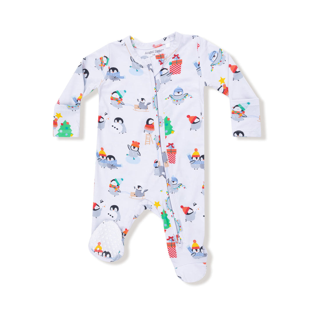 Baby onesie with penguin and snowman pattern on a white background