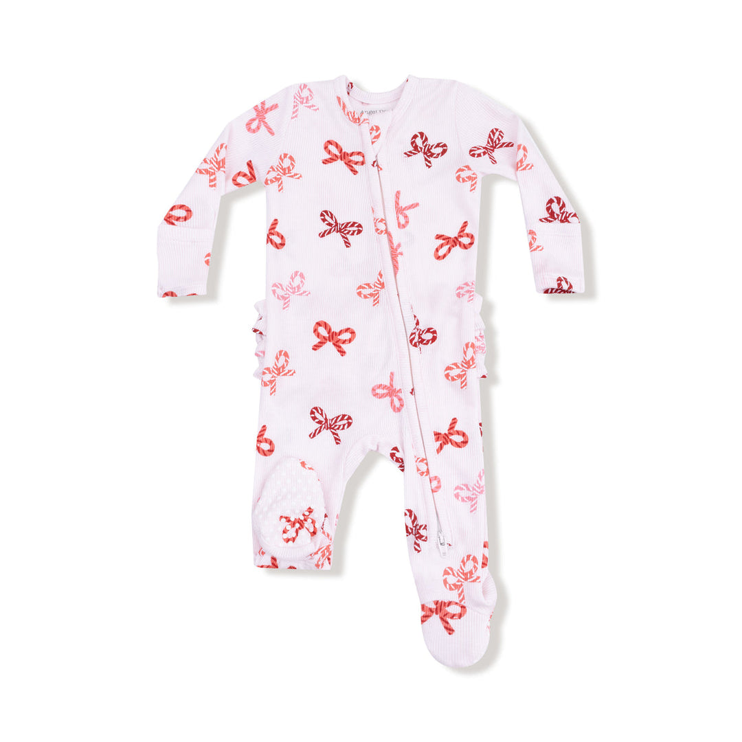 Baby onesie with red candy cane bows pattern on a white background