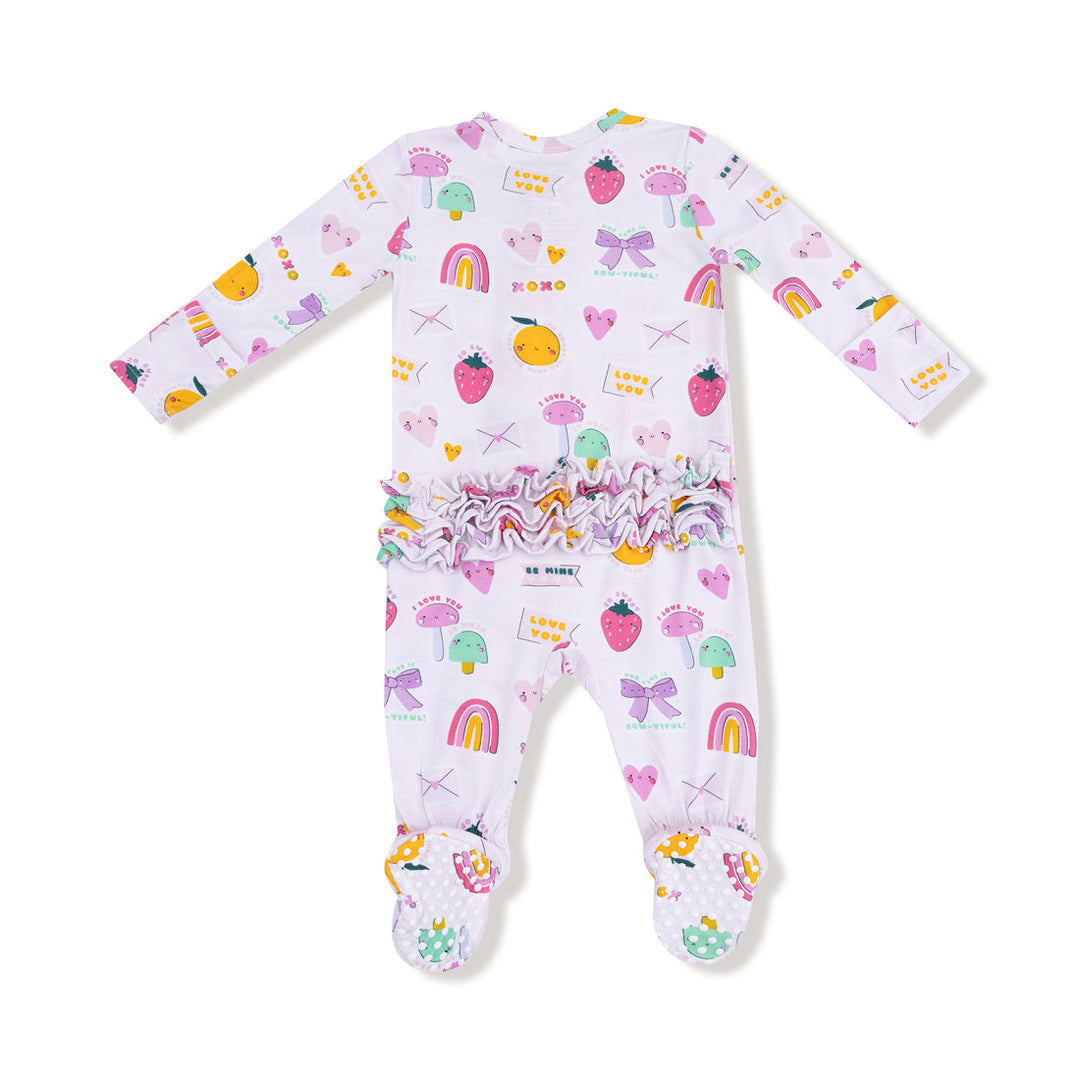 Baby onesie with colorful patterns on a white background