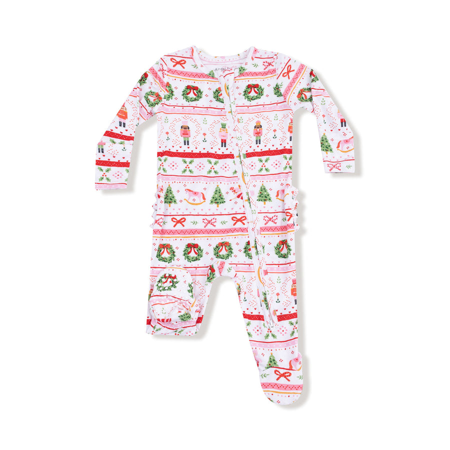 Christmas-themed baby onesie with patterns on a white background