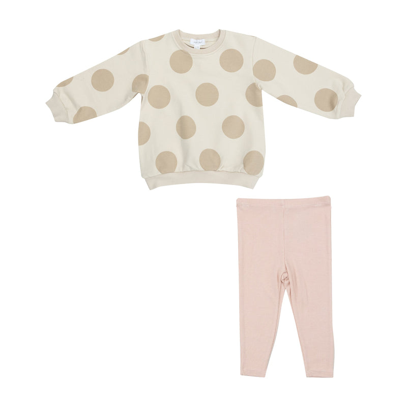 outfit set with beige sweatshirt and big tan polka dots and pink leggings. 