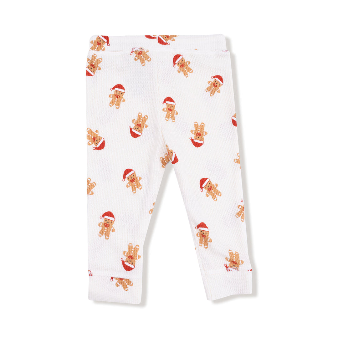 back of White pants with gingerbread man pattern on a white background