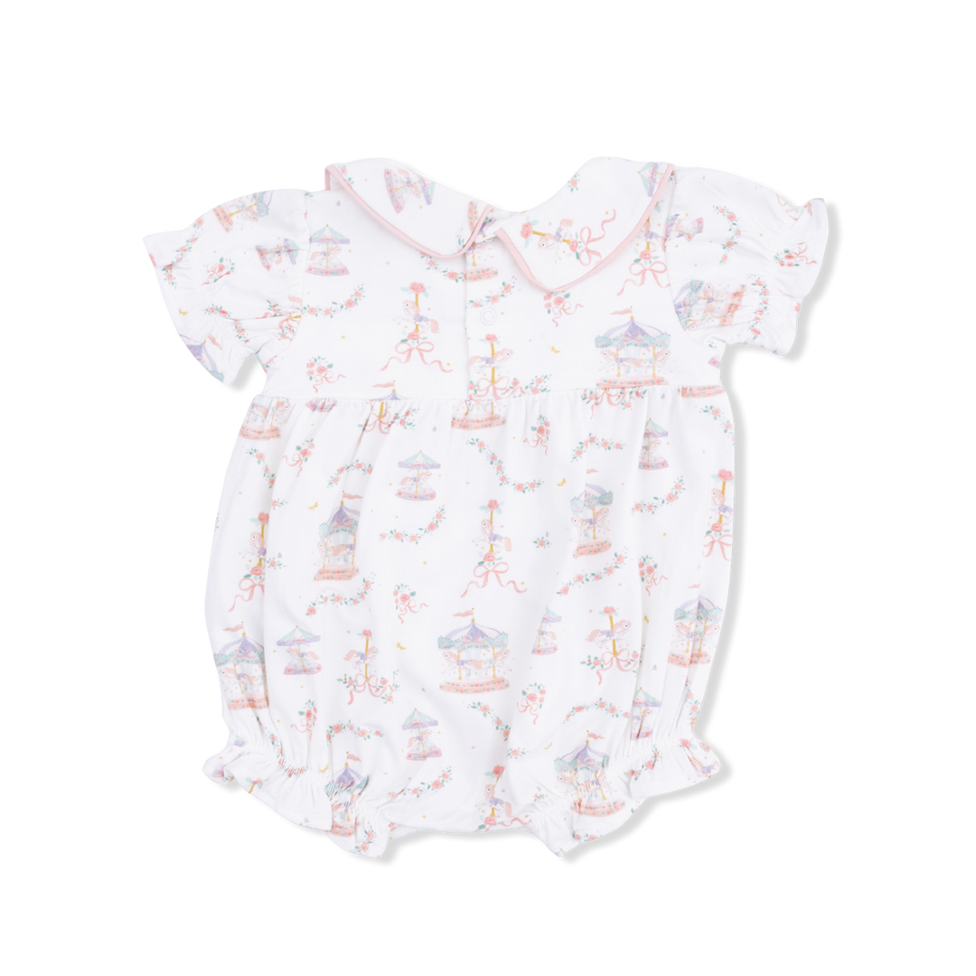Baby romper with animal carousel pattern on a white background