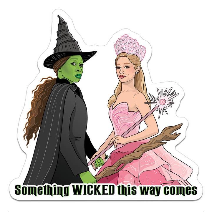 die cut vinyl sticker of Ephaba and Glinda in the movie Wicked: Something Wicked this way comes is the text at the bottom of the sticker. 
