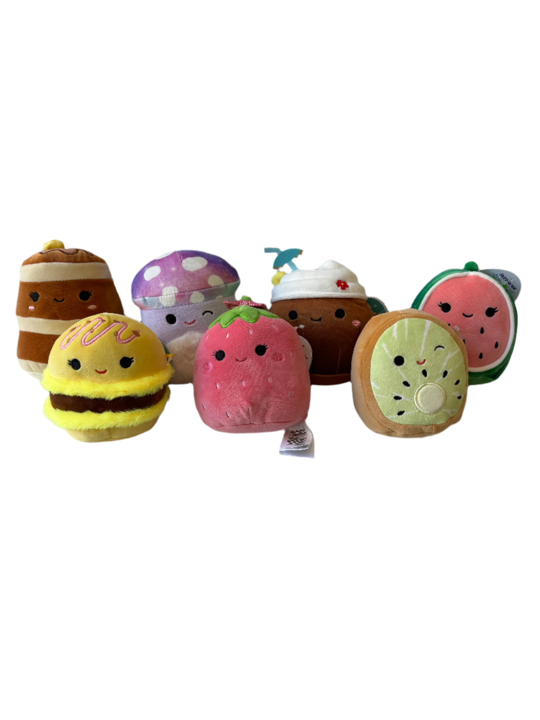 Colorful toy set resembling a sandwich, cake, and watermelon